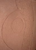 Lehmputz in Rosa-Braun mit eingearbeiteter ovaler Form